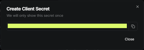 Client secret shown once with a copy button